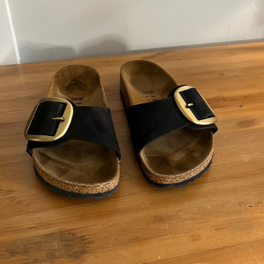 Never worn Madrid big buckle sandals.